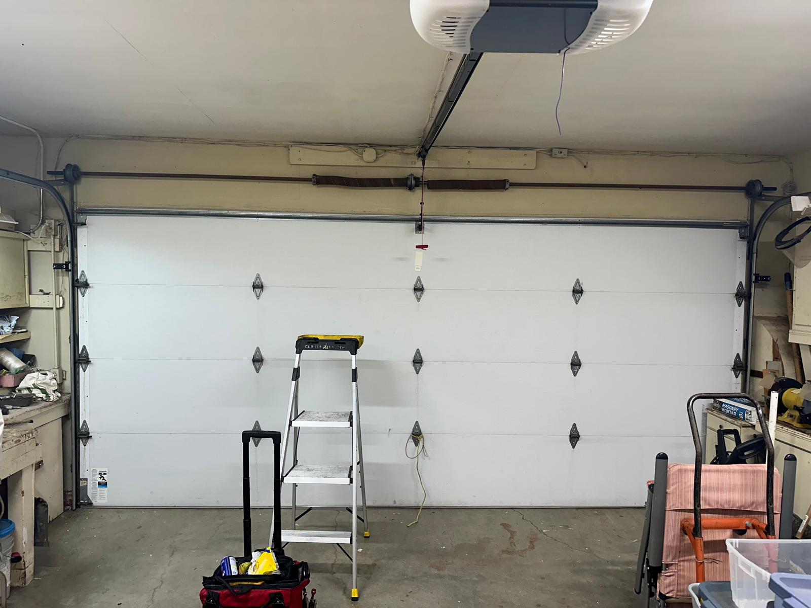 Complete garage door system with opener